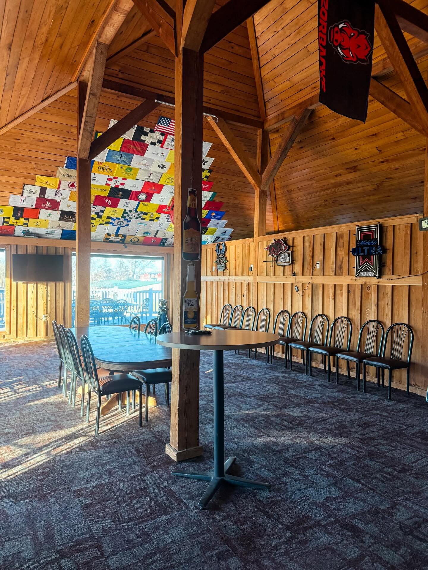 The vaulted timber dining room with pennant flags at The Creeks clubhouse