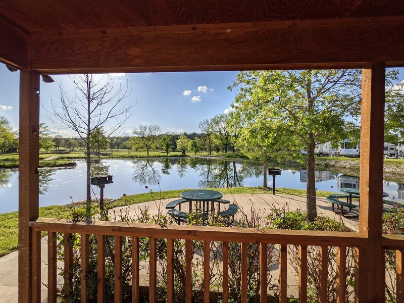 The covered pavilion overlooking the pond